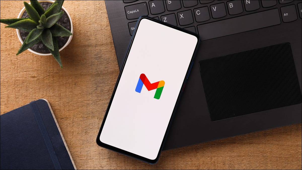gmail-logo-on-a-smartphone-next-to-a-computer